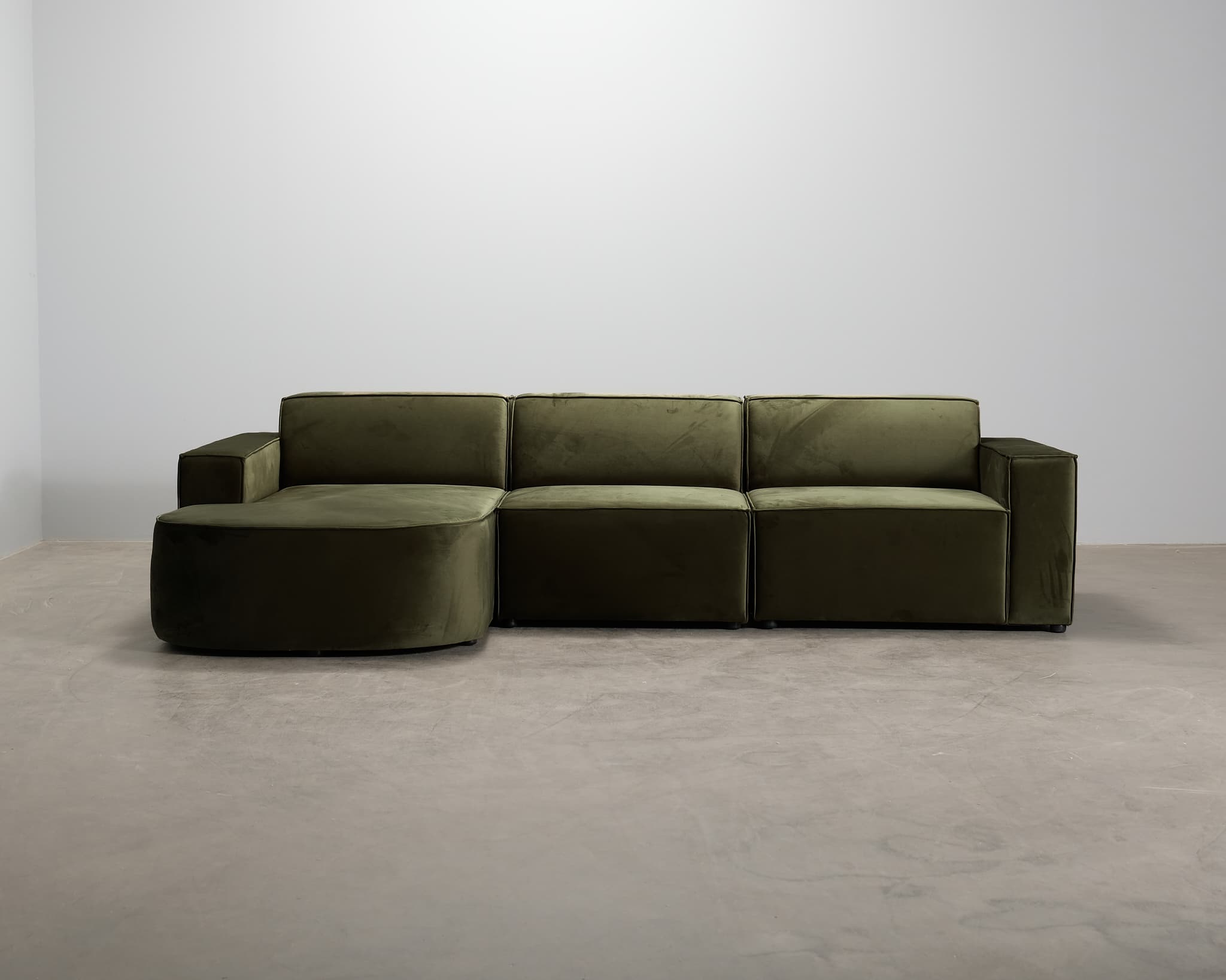 Micadoni Jodie 4-sits divansoffa mörkgrön