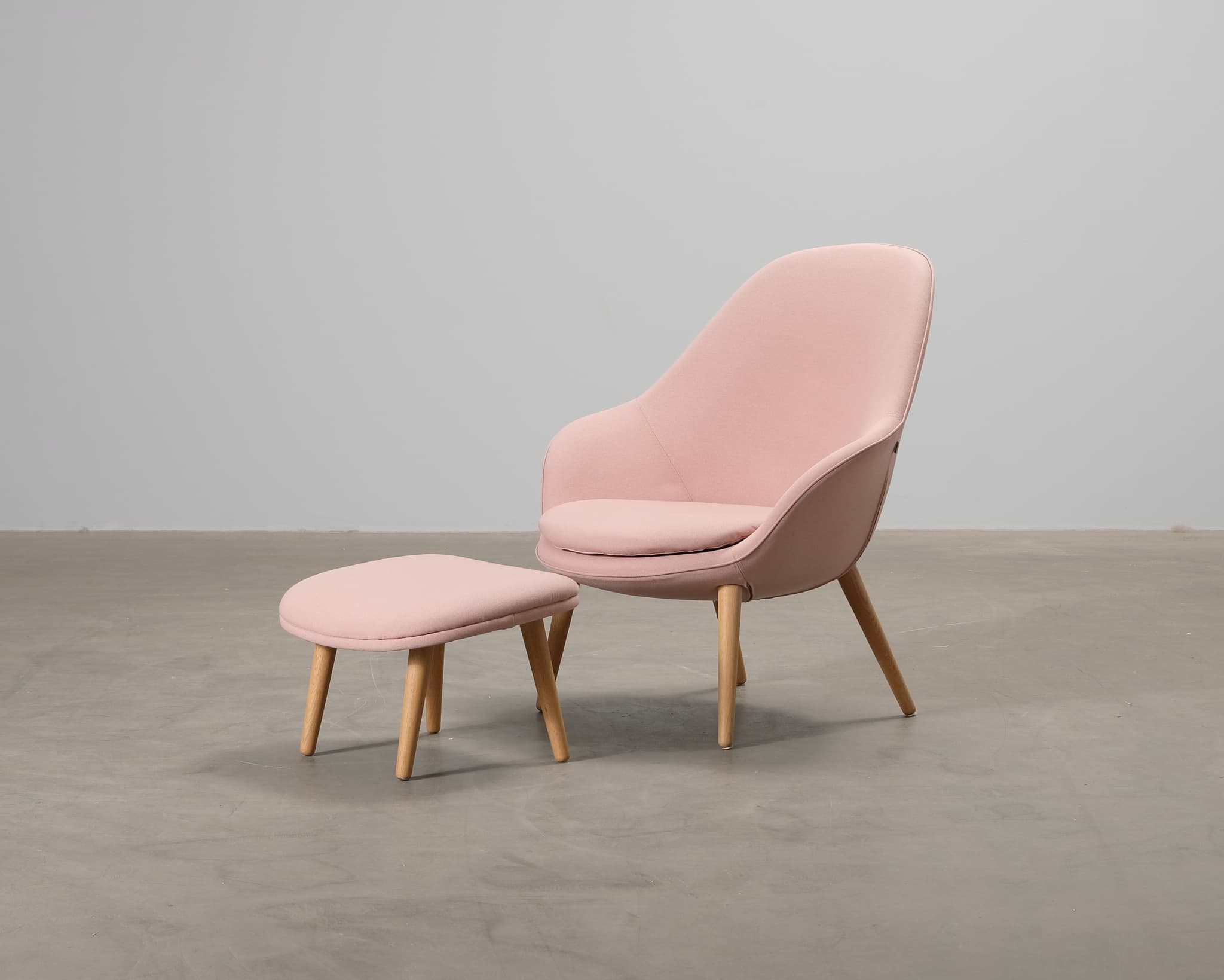 BoConcept Adelaide fåtölj med fotpall rosa